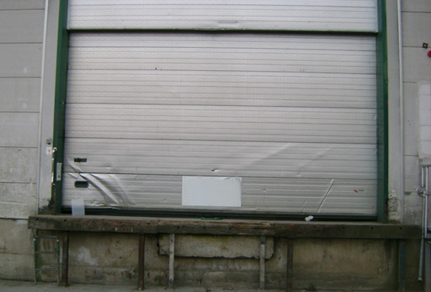 Reparatie garagedeur (voor)